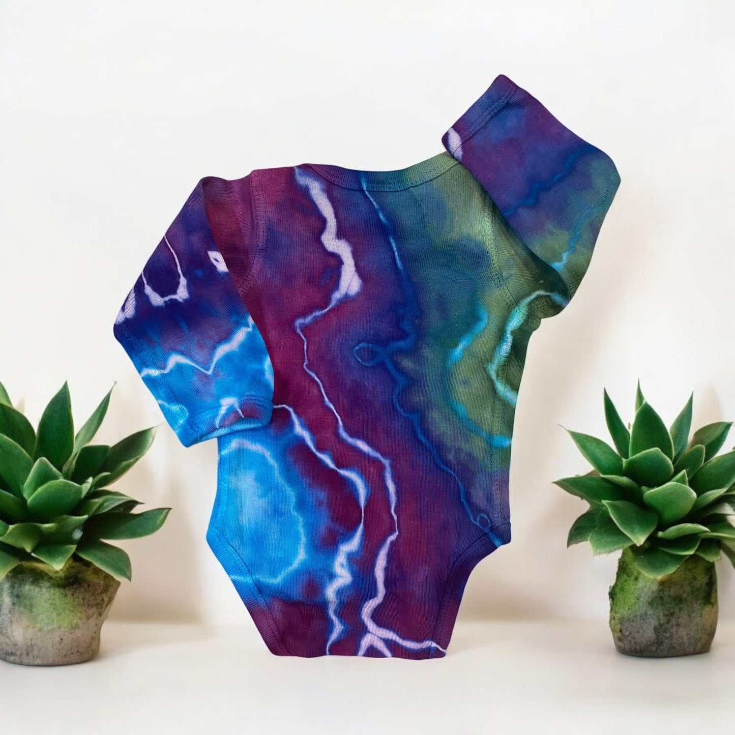 Blue, Green and Purple Geode Design Long Sleeve Onesie